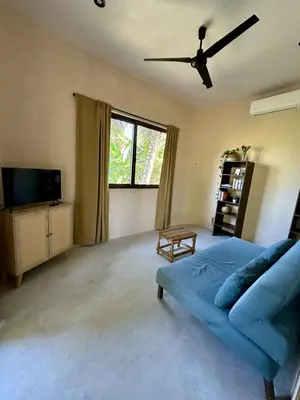 Una televisión o centro de entretenimiento en Casita Kooyuchi