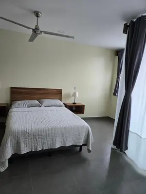 Cama o camas de una habitación en Departamento Huatulco 1 Torre Bel