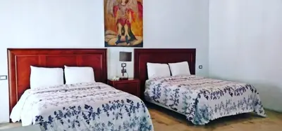 Cama o camas de una habitación en Hotel Real Casa Gloria