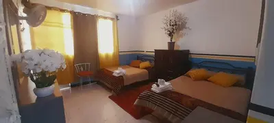 Cama o camas de una habitación en Tranquilo y familiar