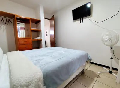 Cama o camas de una habitación en Departamento en el centro de Oaxaca