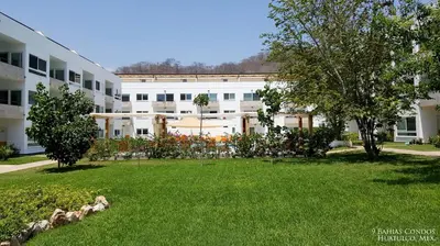 Jardín al aire libre en 9 Bahias Condos con club de playa
