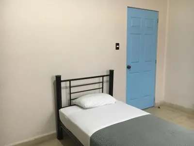 Cama o camas de una habitación en Hostal Andaina