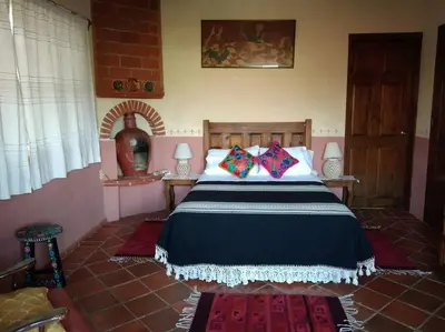 Cama o camas de una habitación en Oaxaca Deleite