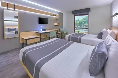 Cama o camas de una habitación en City Express Plus by Marriott Ciudad de México Periférico Sur Tlalpan