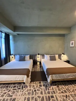 Cama o camas de una habitación en Lusitania Hotel Orizaba
