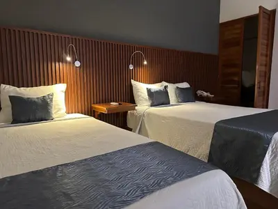 Cama o camas de una habitación en Hotel Pastora