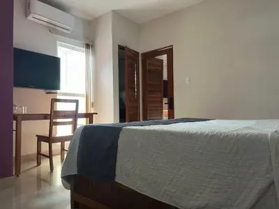 Cama o camas de una habitación en Hotel Pastora