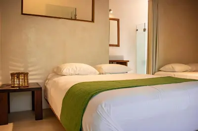 Cama o camas de una habitación en Hotel Noga