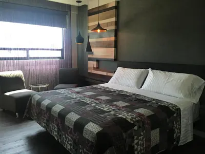 Cama o camas de una habitación en Hotel La Luna