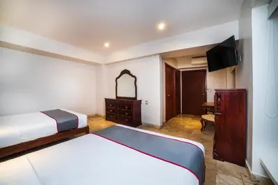 Cama o camas de una habitación en Hotel Imperial