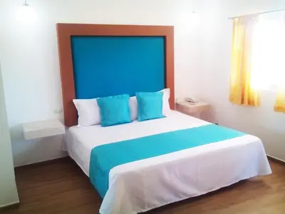 Cama o camas de una habitación en Hotel Kazmay