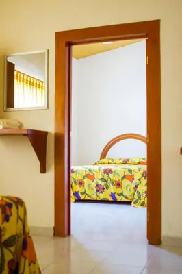 Cama o camas de una habitación en Hotel Kazmay