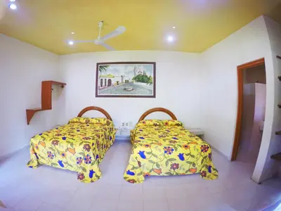 Cama o camas de una habitación en Hotel Kazmay