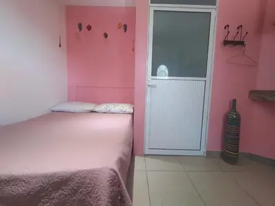 Cama o camas de una habitación en Hospedaje Casa Verde