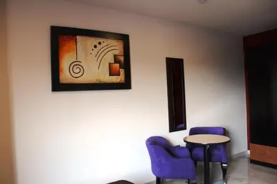 Zona de estar de Hotel Leones