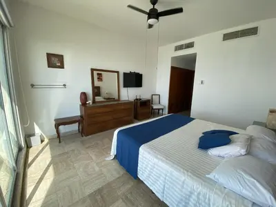 Cama o camas de una habitación en Mayan Playa Departamento Uxmal