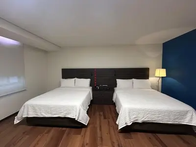 Cama o camas de una habitación en Holiday Inn Express Mexico Aeropuerto by IHG