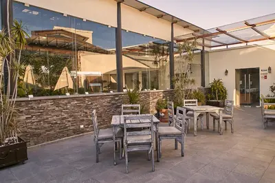 Un restaurante o sitio para comer en Casona de los Sapos Hotel Boutique