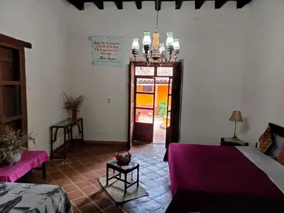 Cama o camas de una habitación en Cabañas y habitaciones Los Cedros