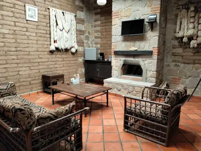 Zona de estar de Cabañas y habitaciones Los Cedros