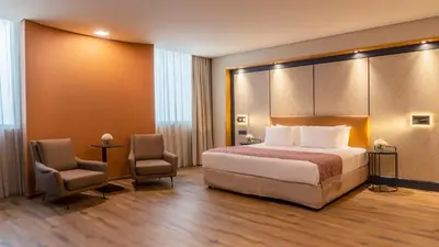 Cama o camas de una habitación en NH Collection Mexico City Airport T2