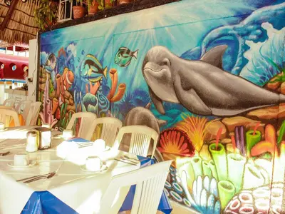 Un restaurante o sitio para comer en Sands Acapulco Hotel & Bungalows