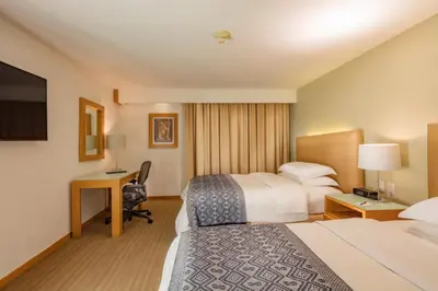 Cama o camas de una habitación en Presidente InterContinental Puebla by IHG