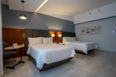 Cama o camas de una habitación en Holiday Inn Puebla Finsa by IHG
