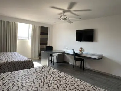Cama o camas de una habitación en Hotel Atenas Plaza