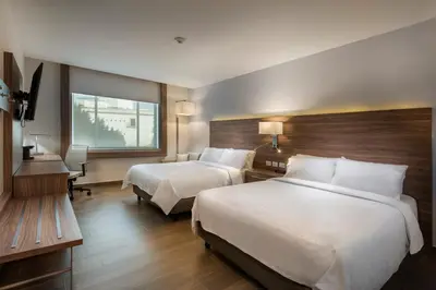 Cama o camas de una habitación en Holiday Inn Express Puebla by IHG