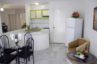 Una cocina o zona de cocina en Hotel Suites Jazmín Acapulco