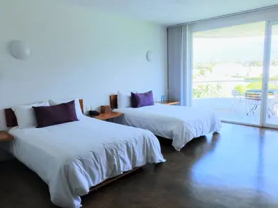 Cama o camas de una habitación en Hacienda Panoaya