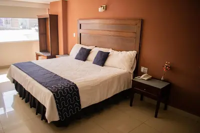 Cama o camas de una habitación en Hotel Granda Inn