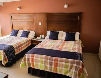 Cama o camas de una habitación en Hotel Granda Inn