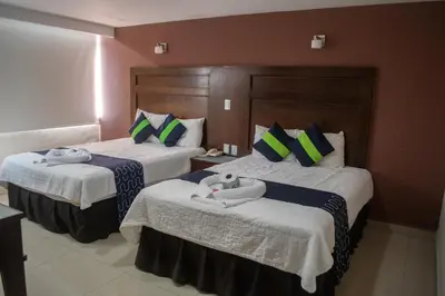Cama o camas de una habitación en Hotel Granda Inn