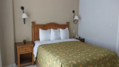 Cama o camas de una habitación en Hotel La Vista