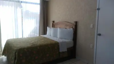 Cama o camas de una habitación en Hotel La Vista