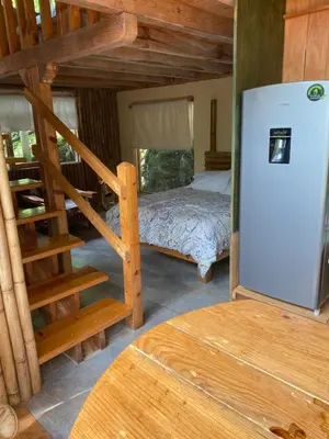 Cama o camas de una habitación en Cabañas Aldea San Francisco de Asís