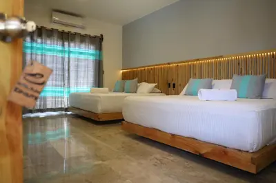 Cama o camas de una habitación en Hotel Playa Zipolite