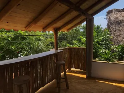 Un balcón o terraza de Cuarto de Tim