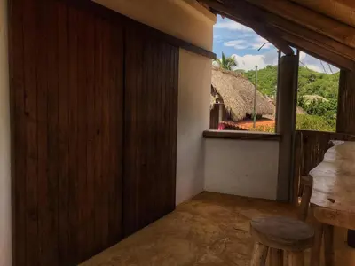 Un balcón o terraza de Cuarto de Tim