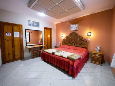 Cama o camas de una habitación en Hotel el Ángel Taxco