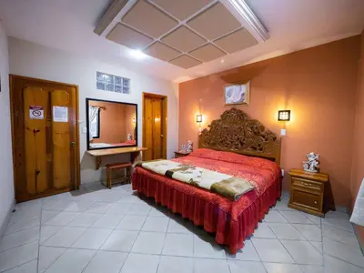 Cama o camas de una habitación en Hotel el Ángel Taxco
