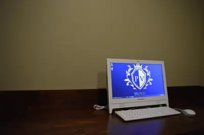 Una televisión o centro de entretenimiento en Hotel Posada del Virrey