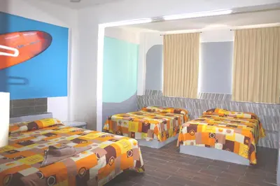 Cama o camas de una habitación en Hotel Arrecife Huatulco Plus