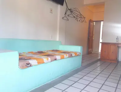 Cama o camas de una habitación en Hotel Arrecife Huatulco Plus