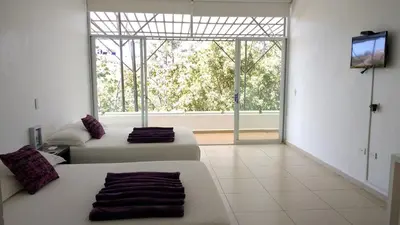 Cama o camas de una habitación en Rancho Macloy Hotel Spa & Social Events