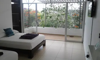 Cama o camas de una habitación en Rancho Macloy Hotel Spa & Social Events