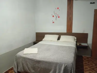 Cama o camas de una habitación en Hospedaje San Antonio Tepoztlán.